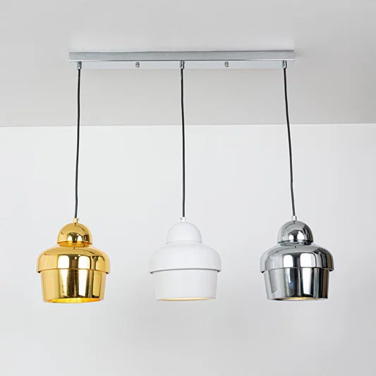 Gold white and chrome metal pendant lights showcasing stylish designs for contemporary home decor.