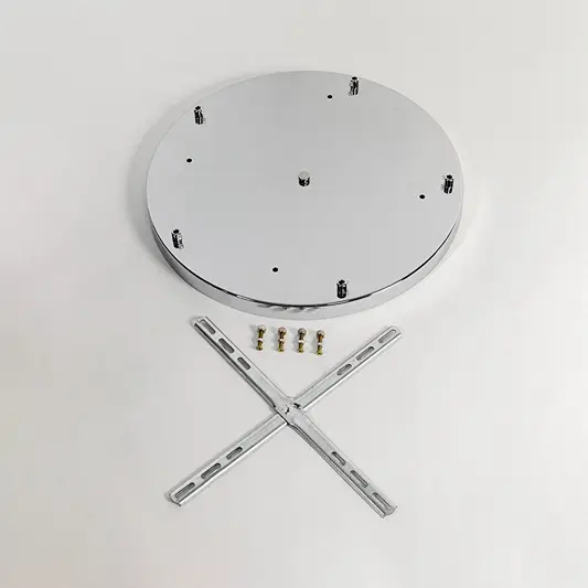White metal ceiling plate with mounting hardware for pendant light chandelier and ceiling lighting on white background.