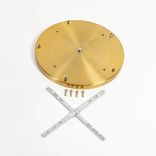 Round gold metal ceiling canopy with mounting hardware displayed on white background for pendant and chandelier installation support.