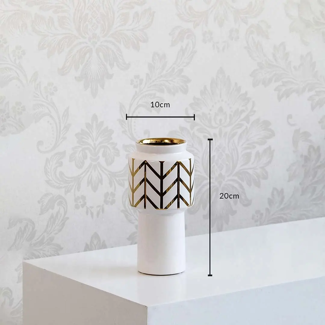 A white and gold decorative vase displayed with size markings showing 10 cm width and 20 cm height for clear and accurate product dimensions.