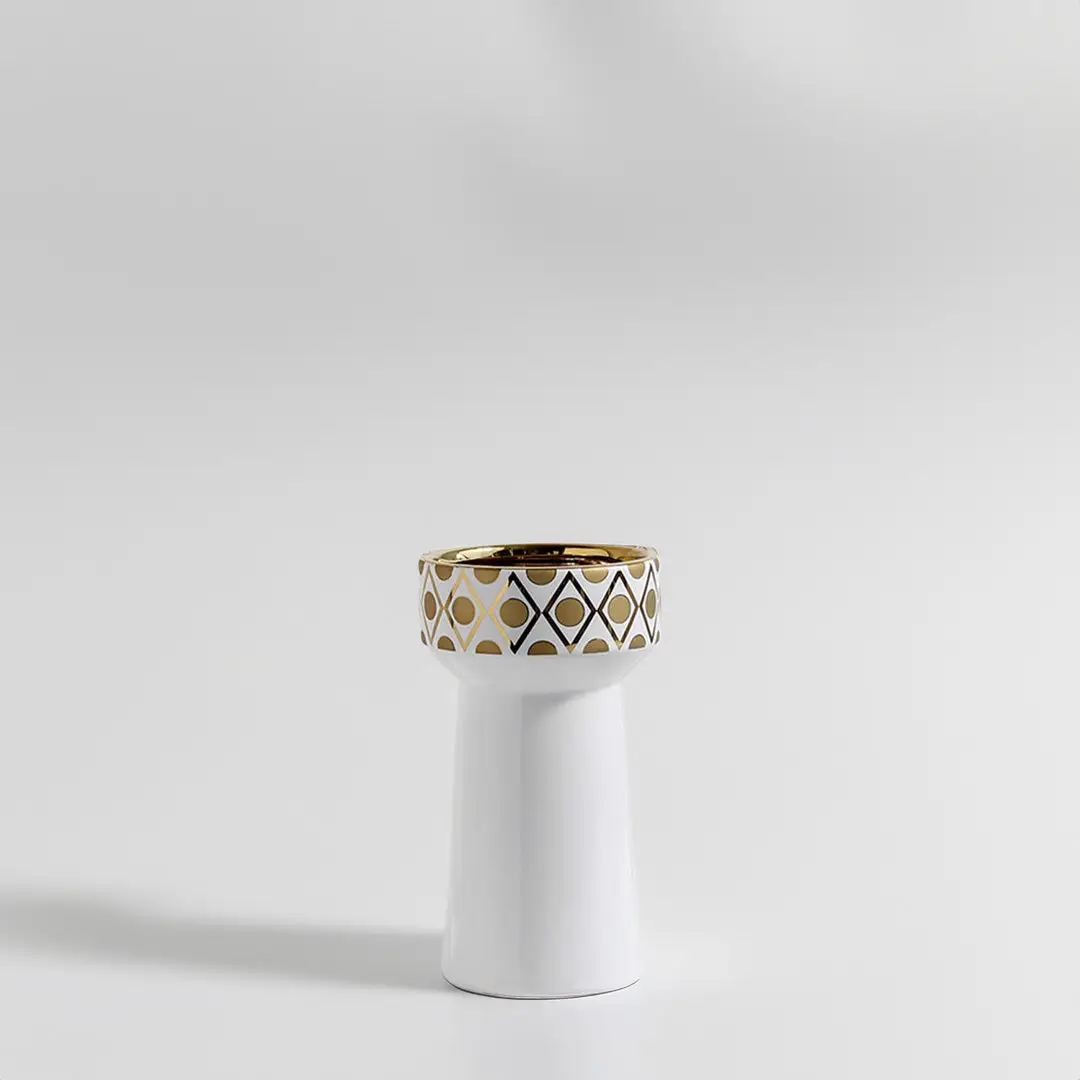 Minimalist matte white ceramic pedestal vase with gold geometric rim for luxury modern home decor and elegant shelf display.