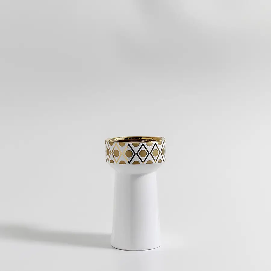 Minimalist matte white ceramic pedestal vase with gold geometric rim for luxury modern home decor and elegant shelf display.