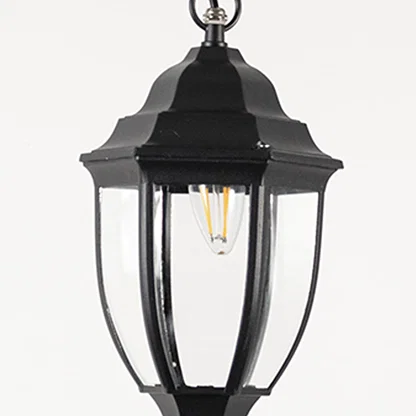 Contemporary black metal hanging lantern light with curved clear glass and sleek frame for patio decor.