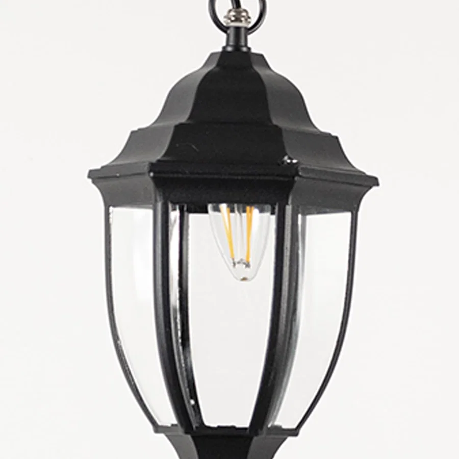 Contemporary black metal hanging lantern light with curved clear glass and sleek frame for patio decor.