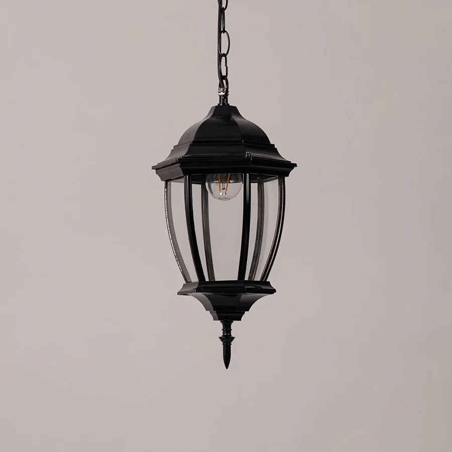 Contemporary black metal hanging lantern light with clear curved glass for stylish outdoor decor.