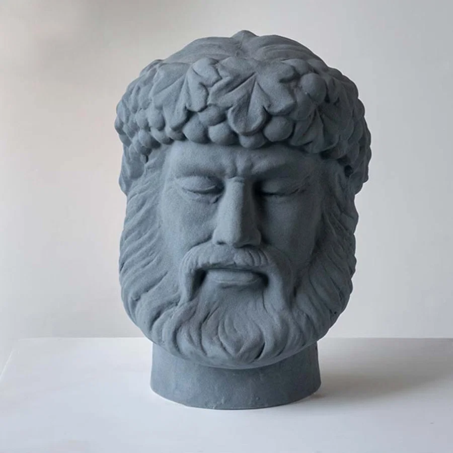 Grey ceramic decorative face sculpture with classical portrait design for elegant tabletop styling and home decor.