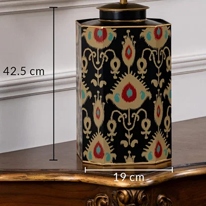 Table lamp with traditional multicolor patterned ceramic base presented with 42.5 cm height and 19 cm width dimensions.