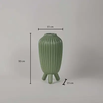 Green ribbed vase displayed with dimensions showing a height of 30 cm a width of 15 cm and a base spread of 15 cm against a clean plain background.