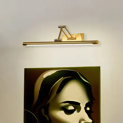 Elegant gold picture light used above framed art for cozy living room styling and premium accent lighting in modern home decor.