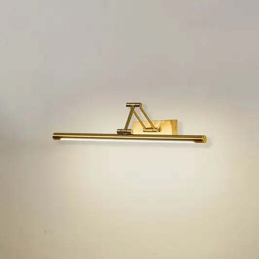 Modern wall light in gold metal finish with linear bar design for bathroom or vanity decor lighting white background.