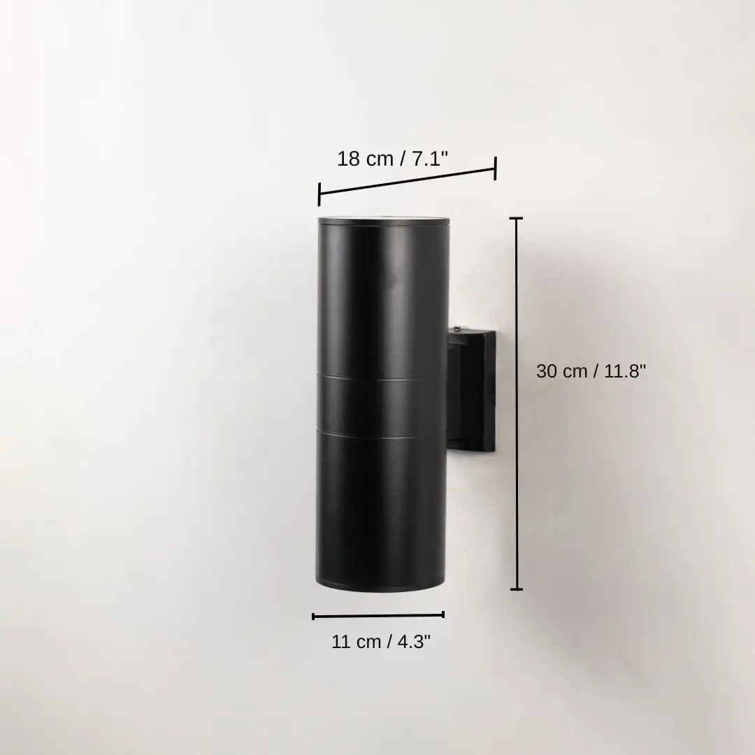 Tall black metal cylindrical outdoor wall light, 20 x 11 x 18 cm (7.9 x 4.3 x 7.1 inches) dimensions