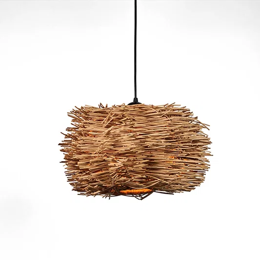 Rustic woven fiber pendant light with layered organic texture and natural finish suspended against soft neutral wall background for earthy home styling.

