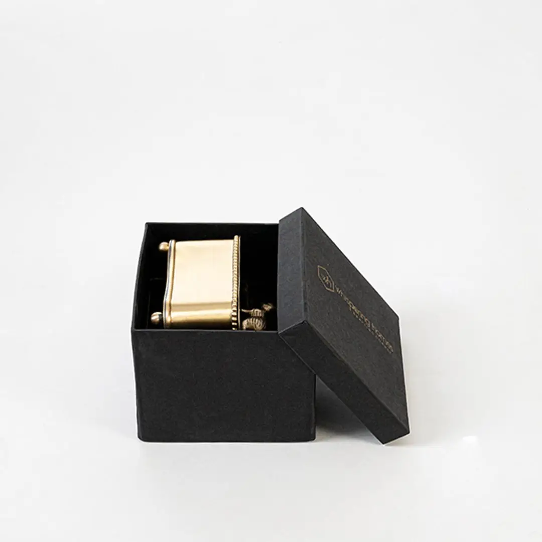 Gold storage box shown with labeled measurements 11 cm height 11.5 cm width and 9 cm depth on white background.