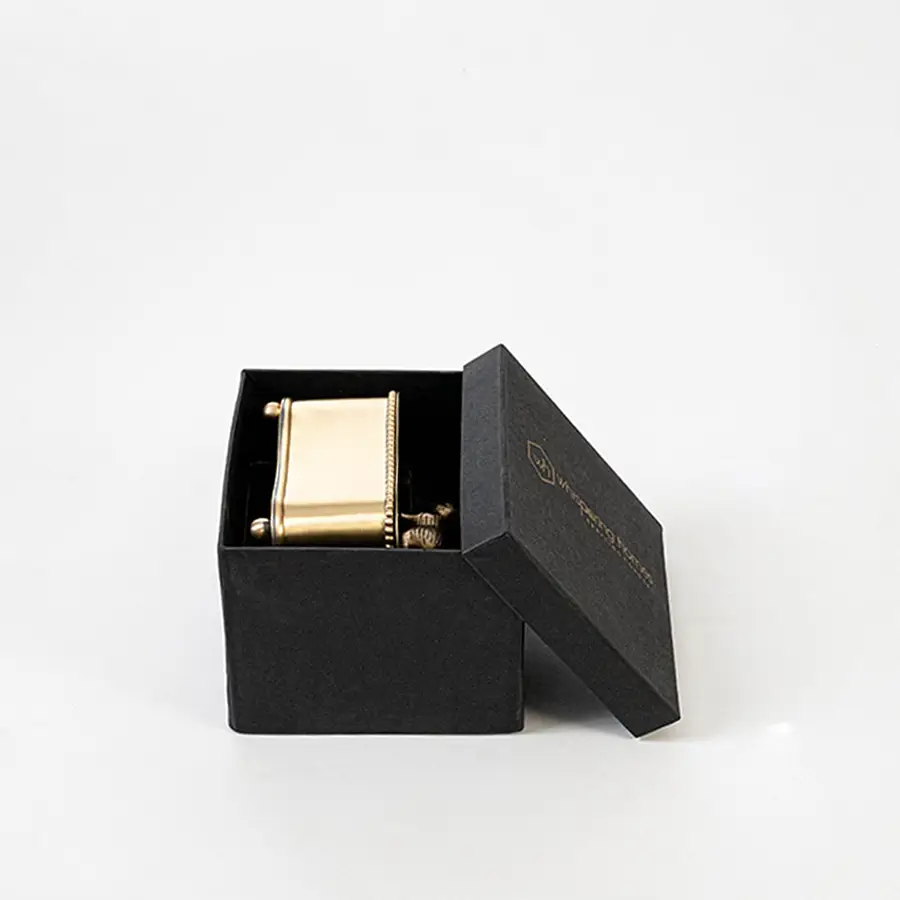 Gold storage box shown with labeled measurements 11 cm height 11.5 cm width and 9 cm depth on white background.