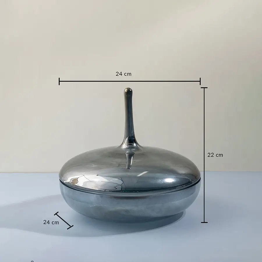 Grey glass jar with tall lid shown with 22 cm height and 24 cm width measurements for modern decorative use.