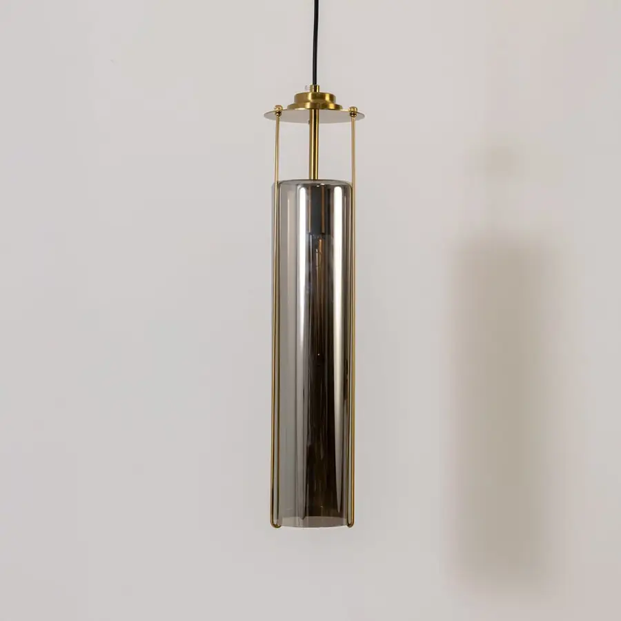 Smoke glass pendant light illuminated to highlight premium modern ceiling lighting with elegant styling.