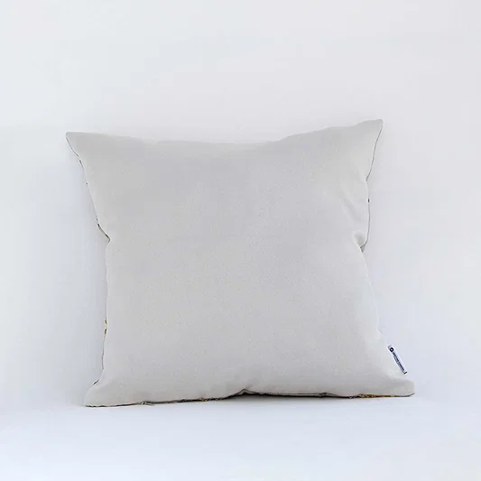 Backside of the cushion cover in beige cotton fabric offering a simple smooth décor style with a breathable soft and skin friendly material ideal for sofas and contemporary interiors.