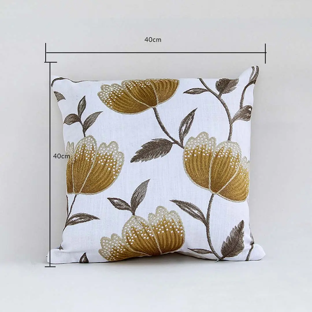 Elegant cushion cover featuring gold toned flowers displayed with width and height guides confirming its 40 cm x 40 cm dimension aiding users in selecting proper home décor sizing.