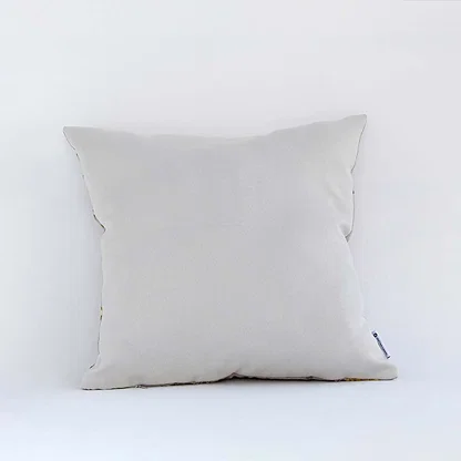 Plain beige cotton cushion cover shown in a clean simple view providing a soft breathable and skin friendly fabric ideal for minimal modern home décor styling.