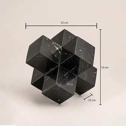 Black marble geometric sculpture showing 15 cm height width and depth dimensions for precise display.