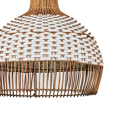 Closeup of woven rattan pendant light showcasing natural brown texture and handcrafted artisan details.