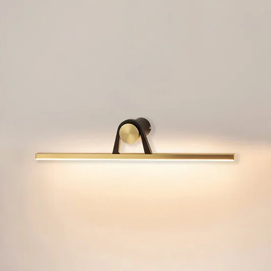 Contemporary wall light in black and gold metal finish with linear bar design for bathroom or vanity decor lighting white background.
