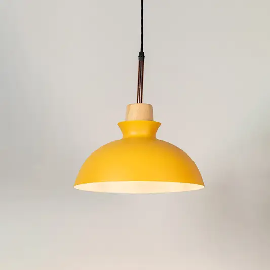 Yellow metal pendant light with natural wood accents and minimalist dome design for contemporary ceiling lighting decor.