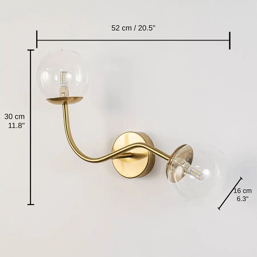 Clear glass globe double arm wall lamp with gold base, base 30 x 12 x 40 cm (11.8 x 4.7 x 15.7 inches), canopy 10 x 10 cm (3.9 x 3.9 inches) dimensions