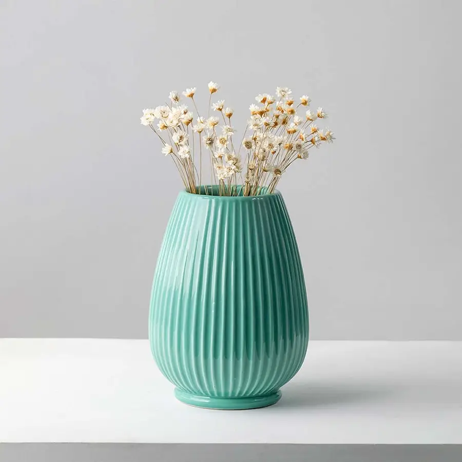 Delicate dried white flower stem styled for minimal home decor adding soft natural texture to modern interior settings.