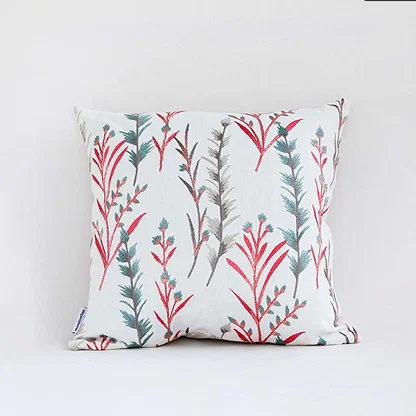 White cotton cushion cover with yellow floral print for sofa couch bedroom and elegant home decor styling.