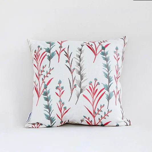 White cotton cushion cover with yellow floral print for sofa couch bedroom and elegant home decor styling.