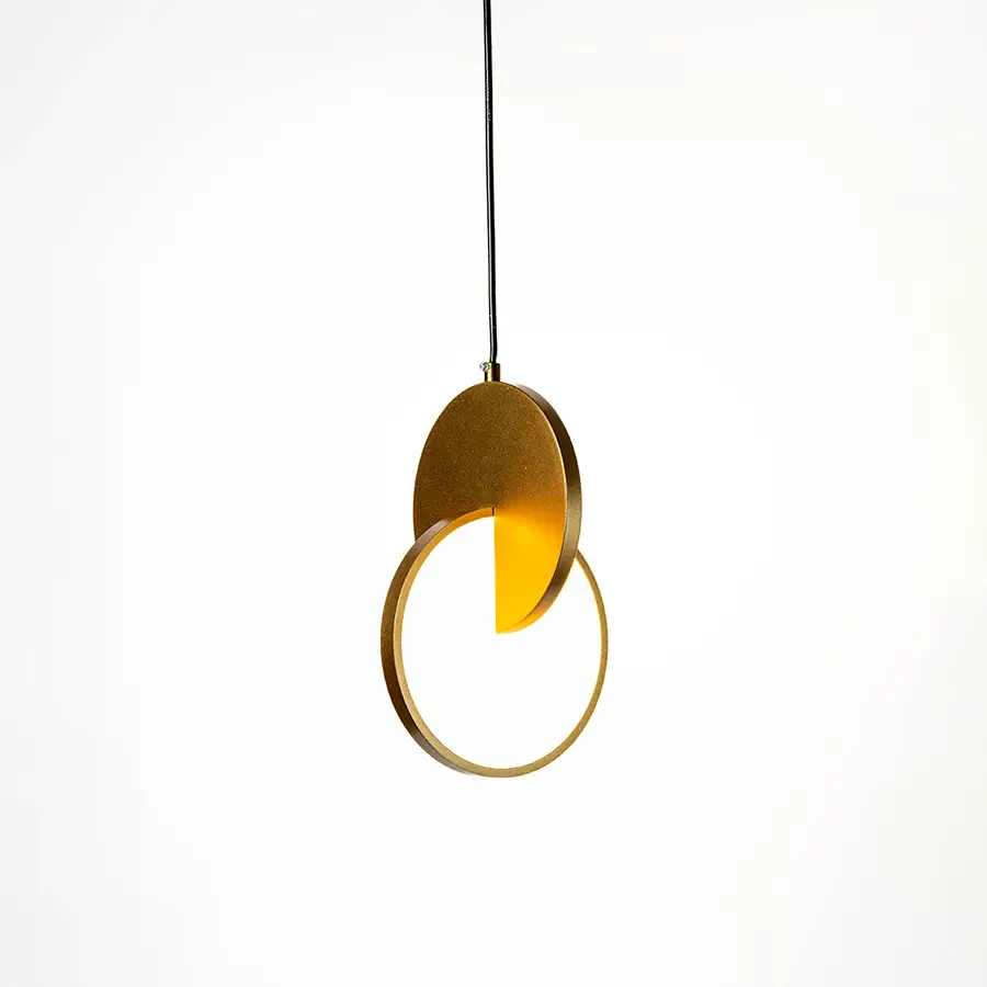 Closeup of terracotta terrazzo pendant light highlighting premium stone texture and artisan detailing.