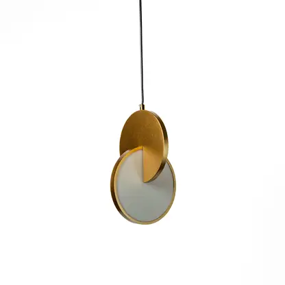 Black metal pendant light with oval diffuser illuminating living room decor with modern elegance.