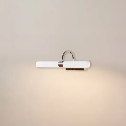 Modern wall light in white metal finish with linear bar design for bathroom or vanity decor lighting white background.