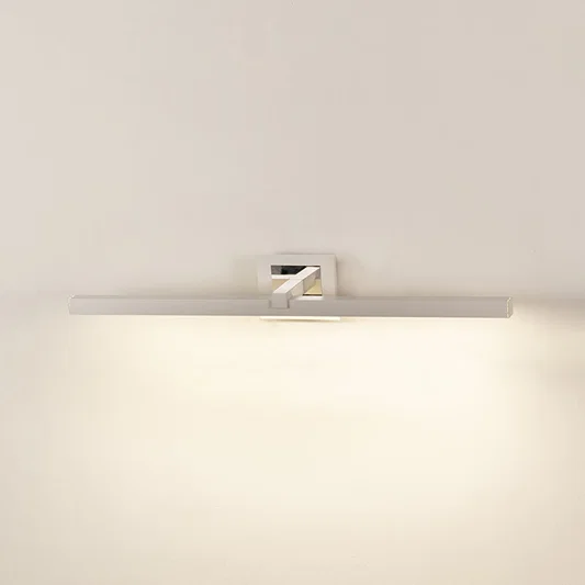 Minimal wall light in chrome metal finish with linear bar design for bathroom or vanity decor lighting white background.