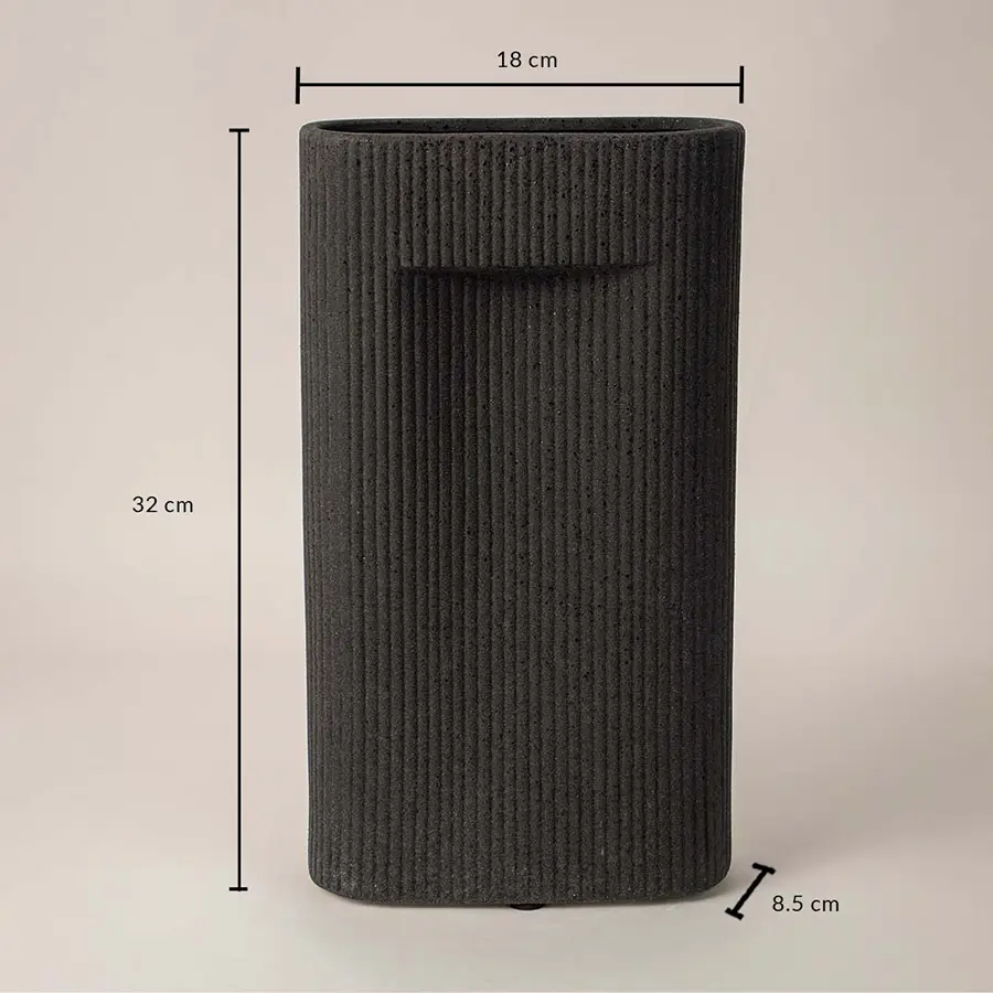 Tall black textured ceramic vase with dimension display placed on white surface against neutral background showcasing size and contemporary home decor design.