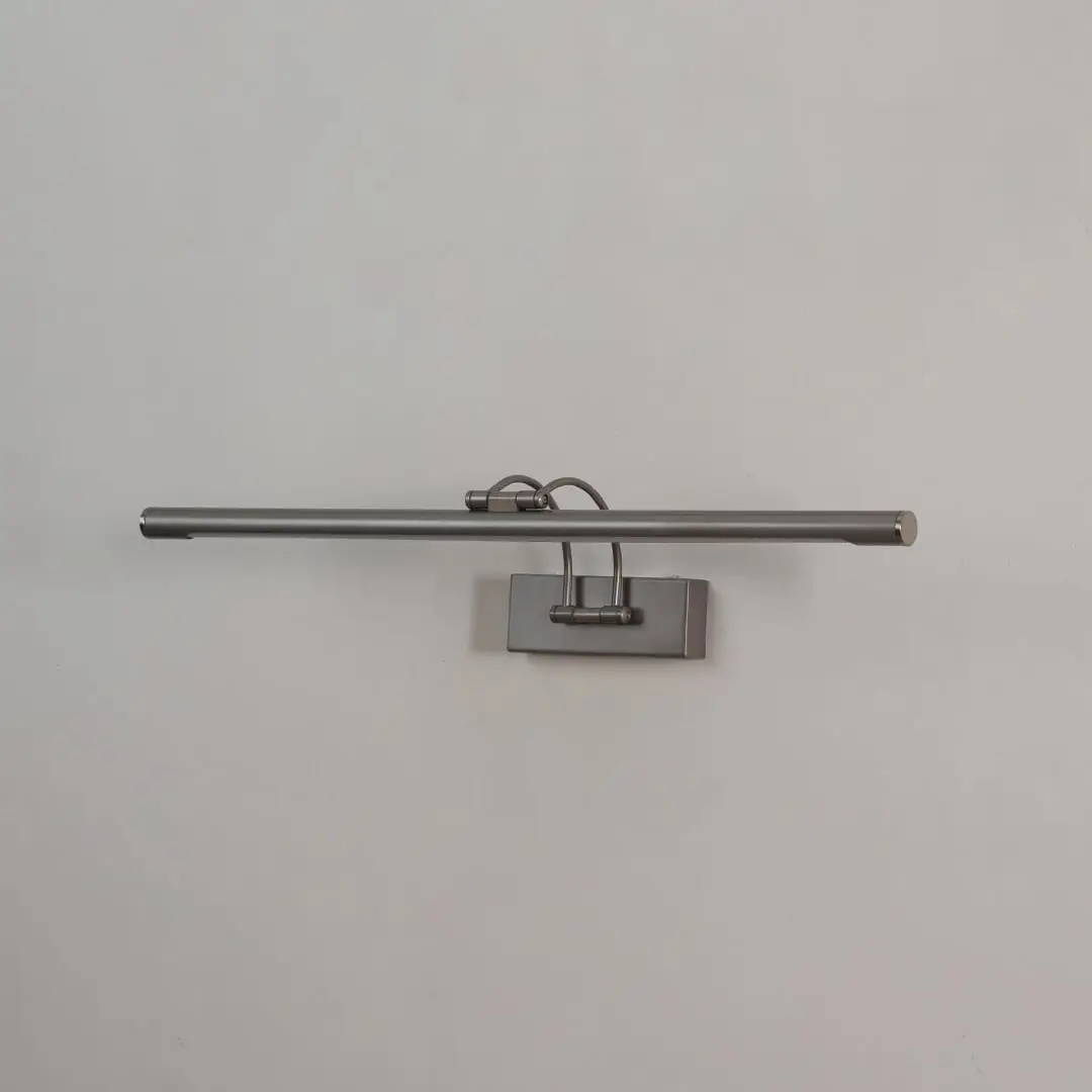 Metal wall picture light displayed on white background with adjustable bar for clean home decor.