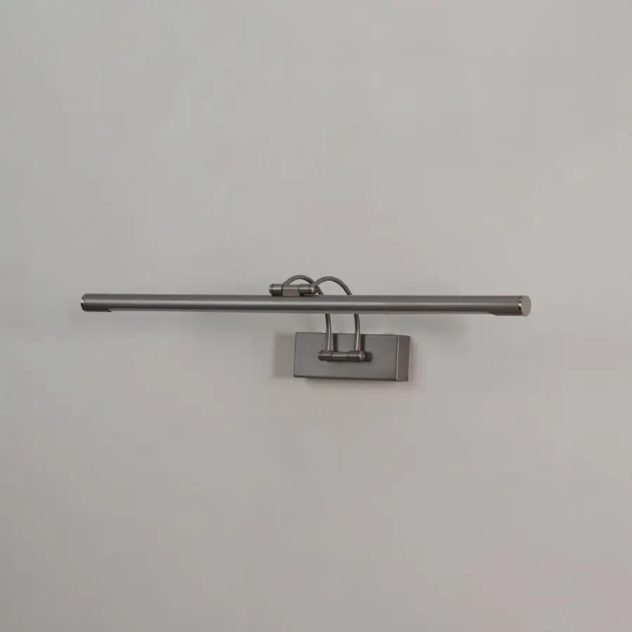 Metal wall picture light displayed on white background with adjustable bar for clean home decor.