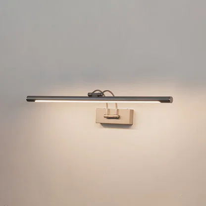 Contemporary wall light in silver metal finish with linear bar design for bathroom or vanity decor lighting white background.