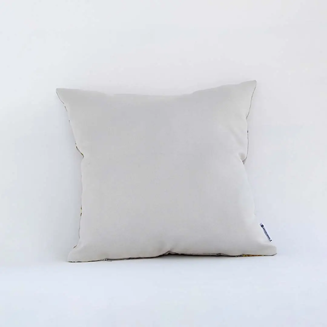 Backside of the cushion cover in beige cotton displayed in a simple view offering a smooth minimal décor style with a breathable gentle and skin friendly fabric texture.