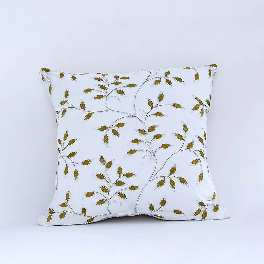 White cotton cushion cover with yellow botanical leaf print for sofa couch bedroom and stylish home decor accents.