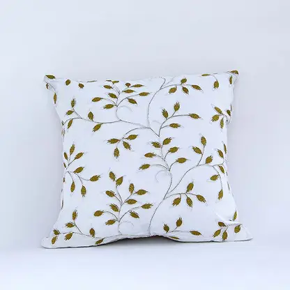 White cotton cushion cover with yellow botanical leaf print for sofa couch bedroom and stylish home decor accents.