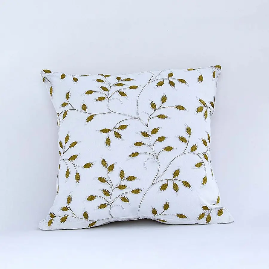 White cotton cushion cover with yellow botanical leaf print for sofa couch bedroom and stylish home decor accents.