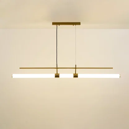 Gold metal linear pendant light with integrated LED bars creating sleek modern ambient lighting for dining spaces.