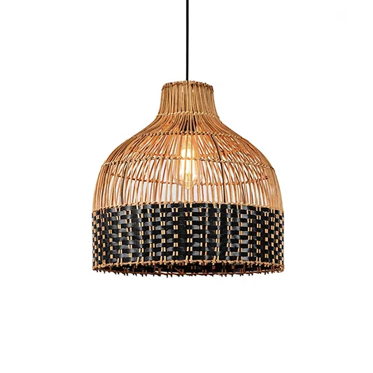 Natural cane pendant light with rounded dome shape and black woven base detail suspended on clean neutral wall background for modern rustic interior decor.
