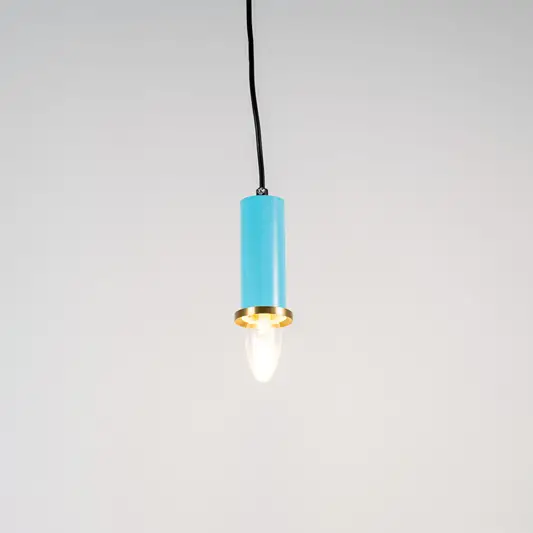 Blue metal pendant light with brass accents and minimalist cylindrical design for contemporary ceiling lighting decor.