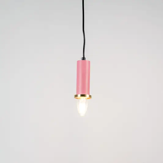 Pink metal pendant light with brass accents and minimalist cylindrical design for contemporary ceiling lighting decor.