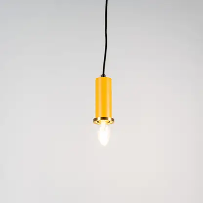 Yellow metal pendant light with brass accents and minimalist cylindrical design for contemporary ceiling lighting decor.
