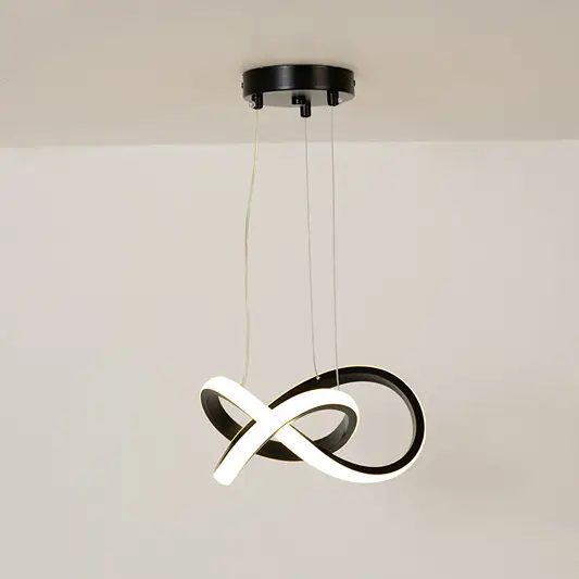 Black metal loop LED pendant light with integrated illumination creating artistic modern ambient ceiling lighting indoors.