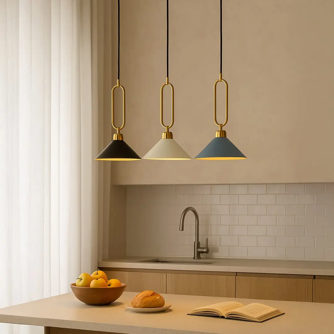 White blue and green metal pendant lights above kitchen island adding modern style and visual warmth.